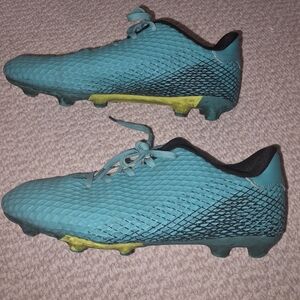 Teal Soccer Cleats with Yellow Accents